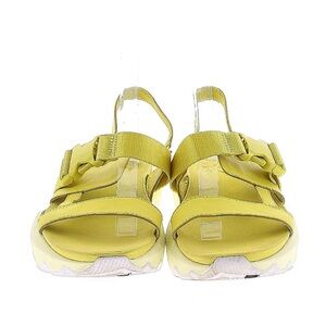 Neon yellow Sorel kinetic sandals